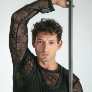 Top de encaje transparente de manga larga negro